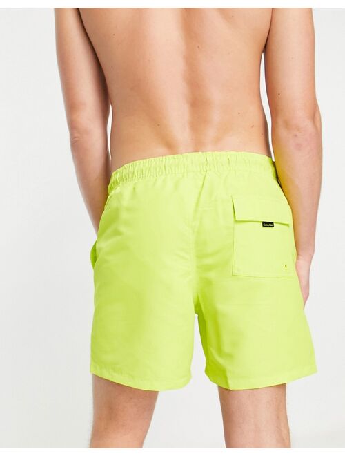 Calvin Klein swim shorts in citrus yellow
