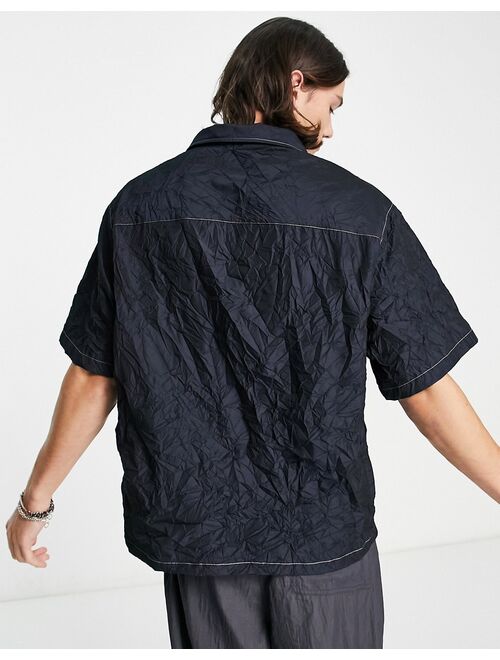 COLLUSION crinkle satin skater shirt with contrast seam in black
