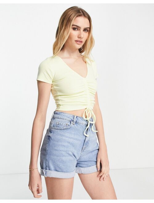 ASOS DESIGN fitted top with ruched front and tie detail in lemon