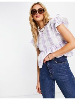 textured smock top with ruffle sleeve in lilac check