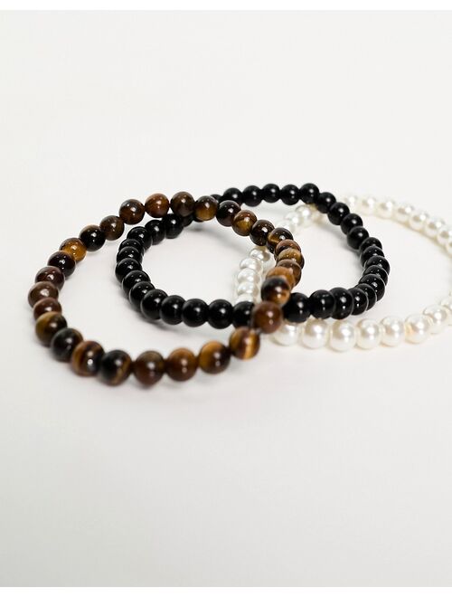 ASOS DESIGN festival 3 pack beaded bracelet set in glass faux pearl and black