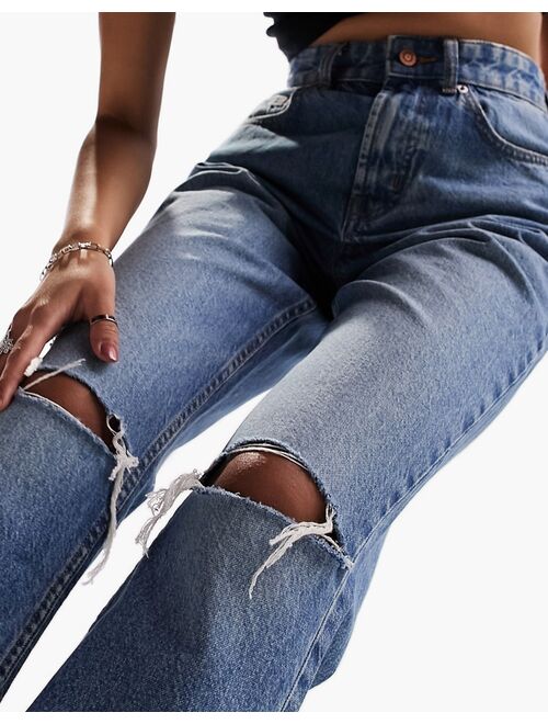 ASOS DESIGN 90s straight jeans in mid blue with knee rips
