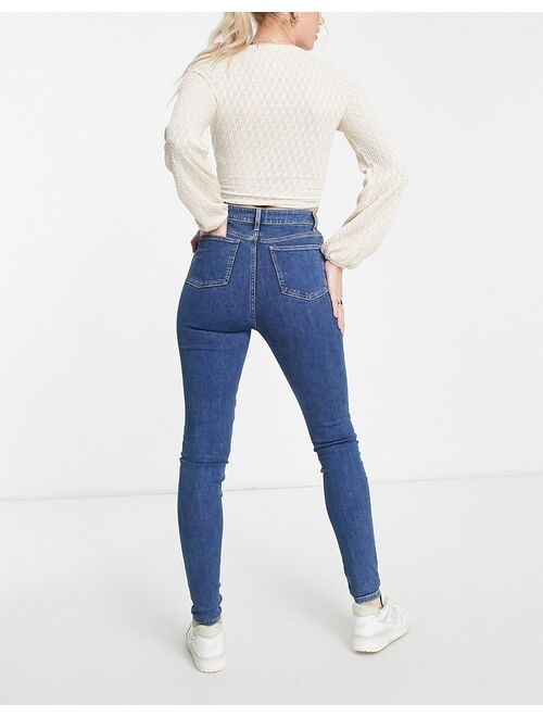 ASOS Tall ASOS DESIGN Tall ultimate skinny jeans in authentic mid blue