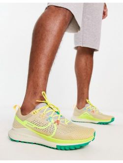 Running Nike React Pegasus Trail 4 sneakers in gold