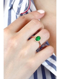 Gem Stone King 0.80 Ct Oval Green Simulated Emerald 10K Rose Gold Halo Diamond Engagement Ring