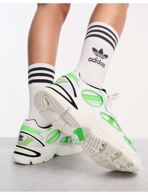 adidas Originals Astir sneakers in white and green