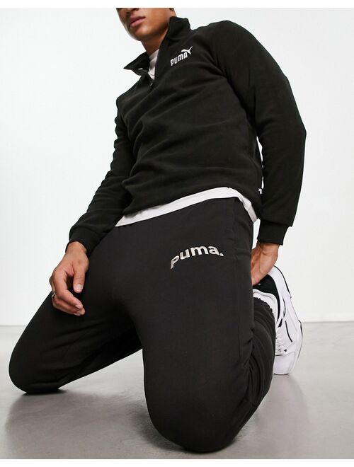PUMA Sports logo sweatpants in black