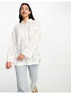 relaxed eyelet shirt with dipped hem in white