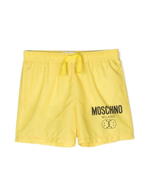 Moschino Kids Smiley logo-print swim shorts