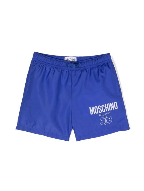 Moschino Kids Smiley logo-print swim shorts