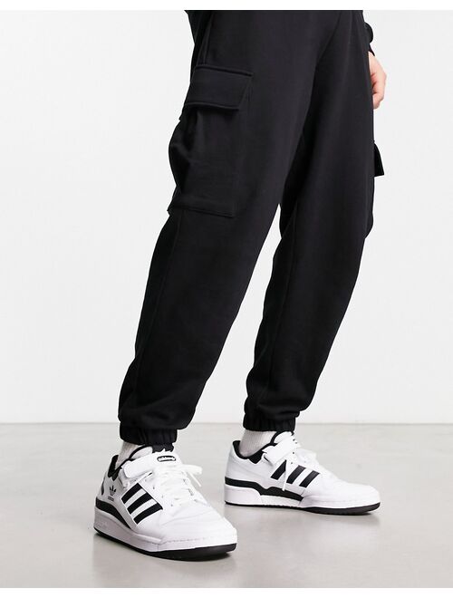 adidas Originals Forum Low sneakers in white and black