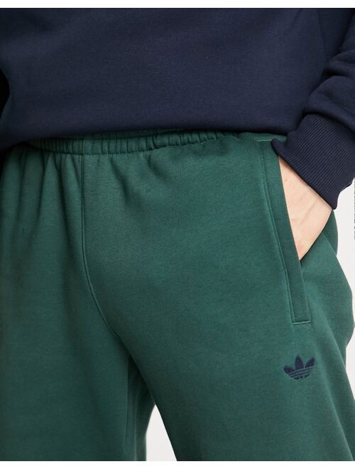 adidas Originals Preppy Varsity large logo oversized sweatpants in dark green
