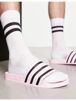 adilette slides in pink
