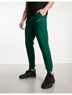 performance adidas Training Sports Club graphic sweatpants in green