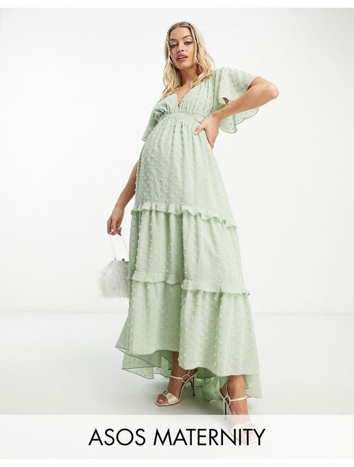ASOS Maternity ASOS DESIGN Maternity angel sleeve plunge textured tiered maxi dress with cut out and rouleux detail in sage