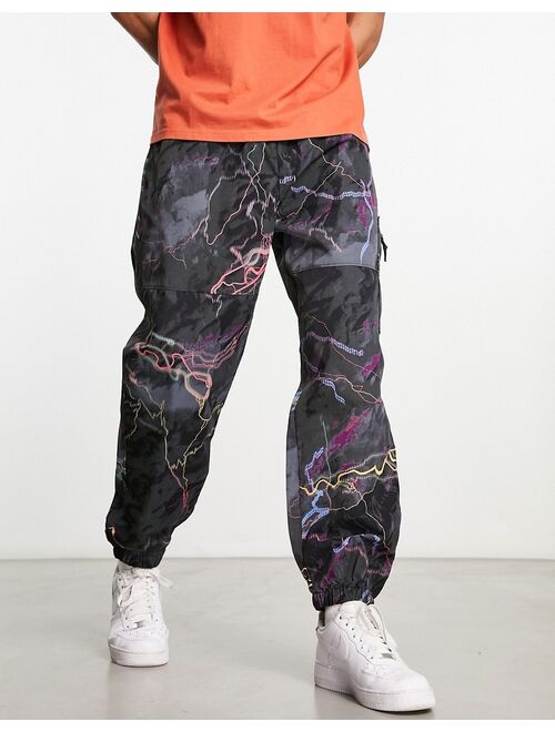 The North Face nylon utility trail glow print sweatpants in black