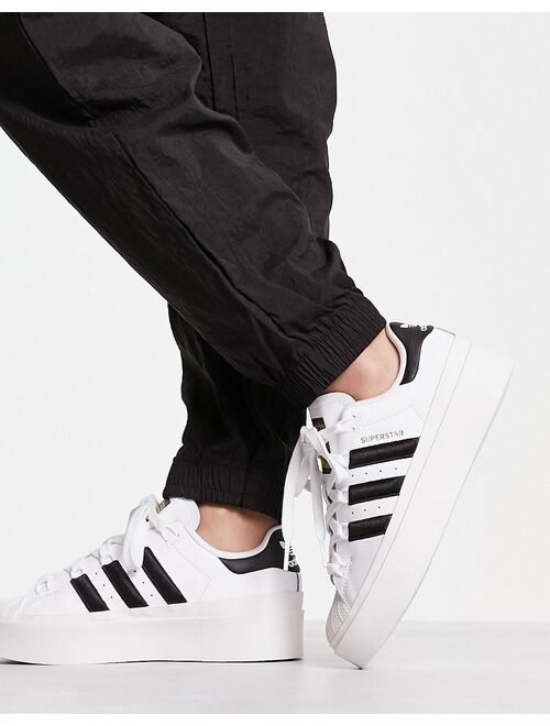 adidas Originals Superstar Bonega sneakers in white and black