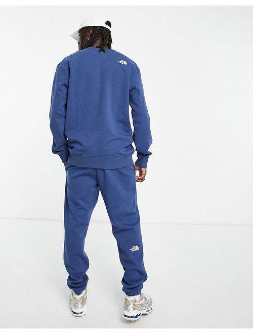 The North Face Essentials sweatshirt in dark blue - Exclusive at ASOS