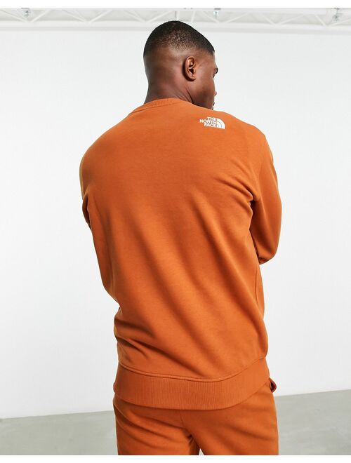The North Face Essentials sweatshirt in tan - Exclusive to ASOS