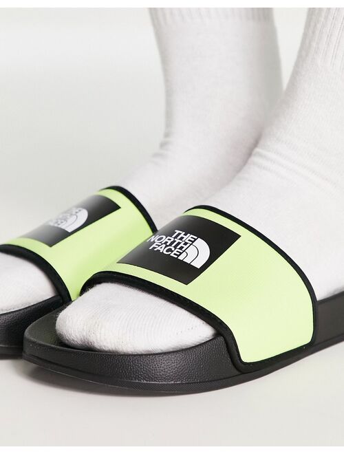 The North Face Base Camp sliders in acid green