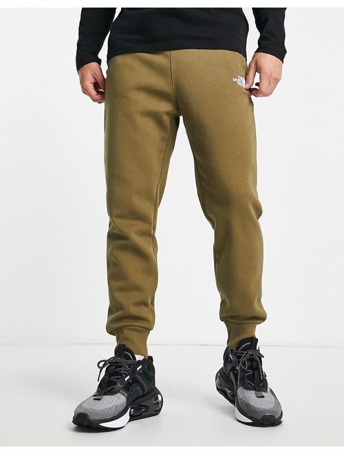 The North Face Graphic joggers in green