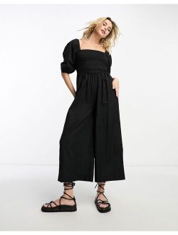 linen look shirred bodice puff sleeve jumpsuit in black