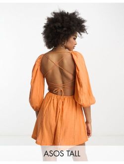 ASOS Tall ASOS DESIGN Tall ladder detail mini beach romper with lace up back in orange