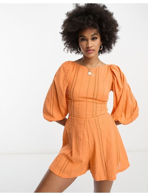 ASOS Tall ASOS DESIGN Tall ladder detail mini beach romper with lace up back in orange