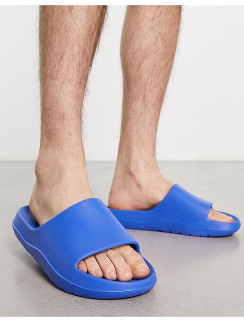 ASOS DESIGN chunky slides in cobalt blue