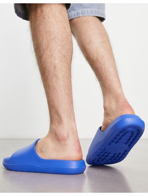 ASOS DESIGN chunky slides in cobalt blue