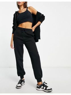 oversized branded sweatpants in black
