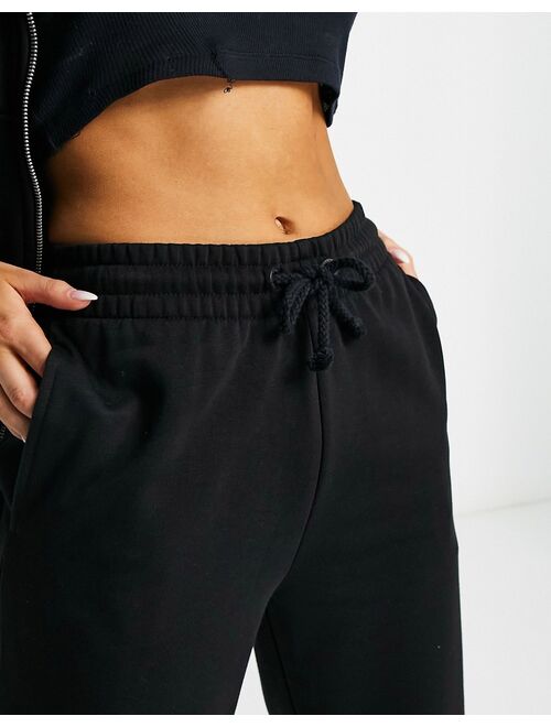 COLLUSION oversized branded sweatpants in black