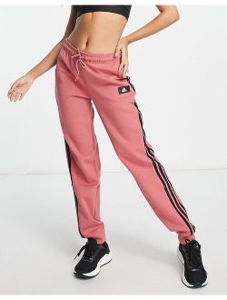performance adidas Sportstyle Future Icons sweatpants in pink