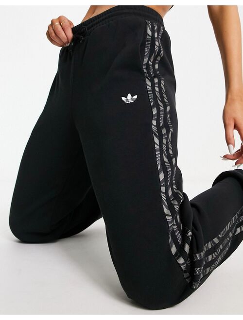 adidas Originals Animal Abstract sweatpants in black