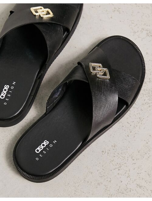 ASOS DESIGN cross strap sandals in black saffiano leather with badge