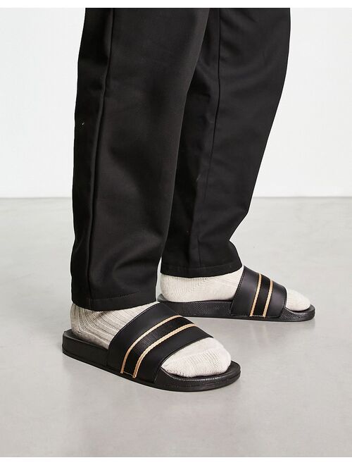 Truffle Collection wide fit gold print sliders in black