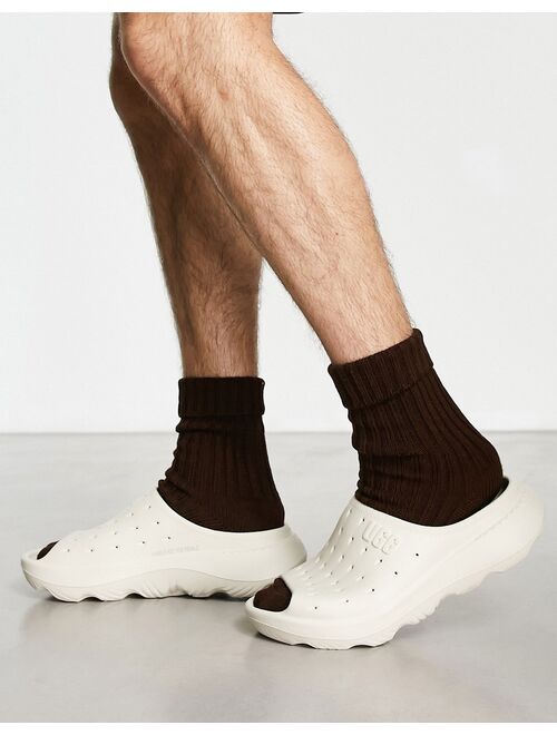 UGG slide it molded clogs in sand