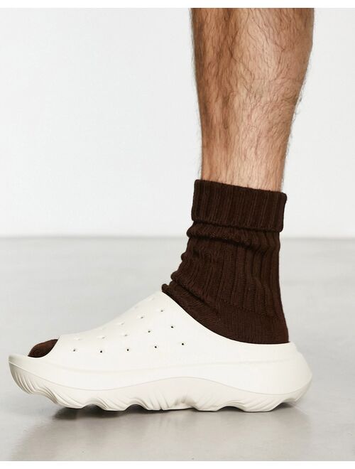 UGG slide it molded clogs in sand