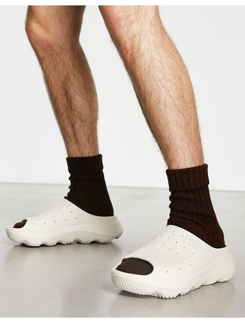 UGG slide it molded clogs in sand