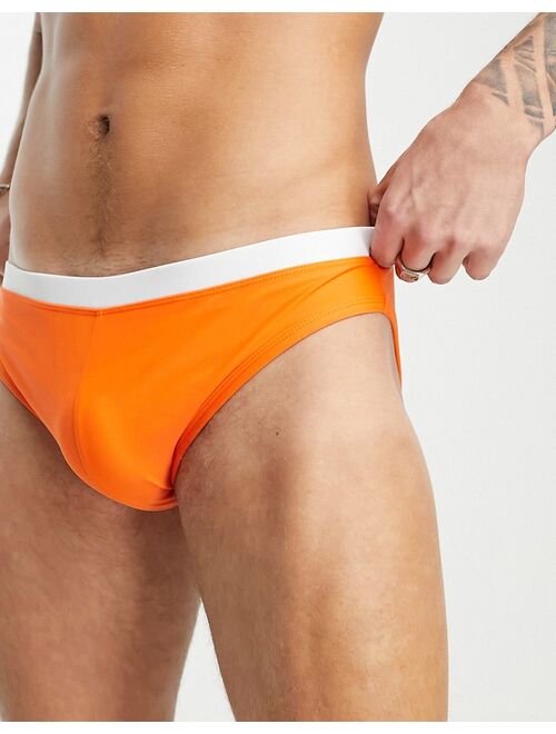 ASOS DESIGN swim briefs with contrast waistband in orange