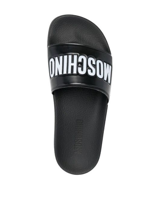 Moschino embossed-logo flat sandals