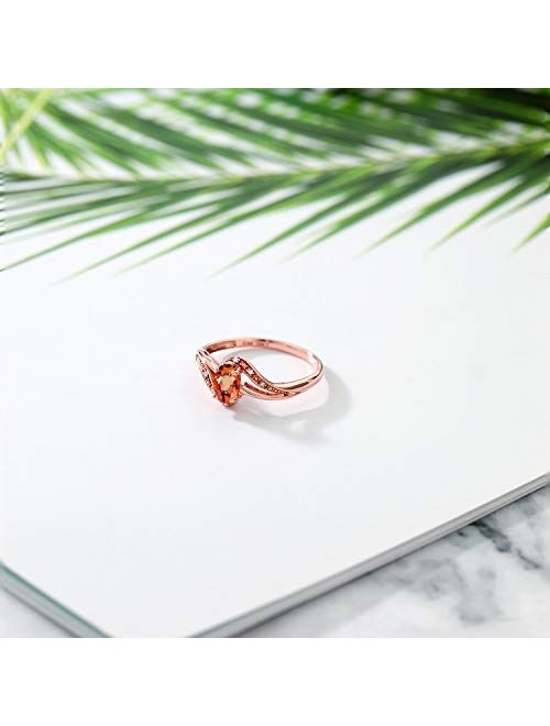 Gem Stone King 10K Rose Gold Orange Sapphire and White Diamond Engagement Bypass Ring For Women (0.59 Cttw, Oval 6X4MM, Available 5,6,7,8,9)