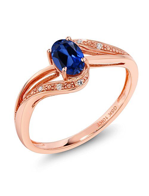 Gem Stone King 10K Rose Gold Blue Created Sapphire and Diamond Women's Engagement Bypass Ring (0.54 Ct Available 5,6,7,8,9)