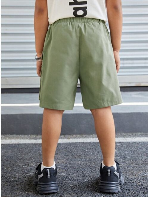 SHEIN Young Boys' Casual Loose Solid Color Cargo Pocket Woven Shorts