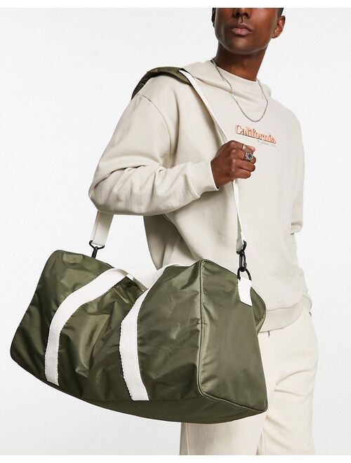 ASOS DESIGN canvas holdall bag with contrast strap in olive