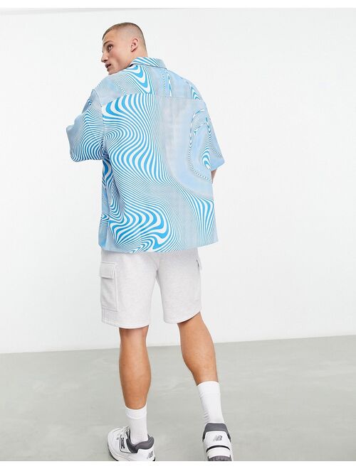 ASOS DESIGN boxy oversized shirt in blue swirl print