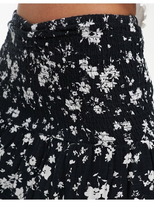 Bershka shirred mini rara skirt in black floral