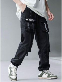SHEIN Kids HYPEME Tween Boy Slogan Graphic Flap Pocket Cargo Pants