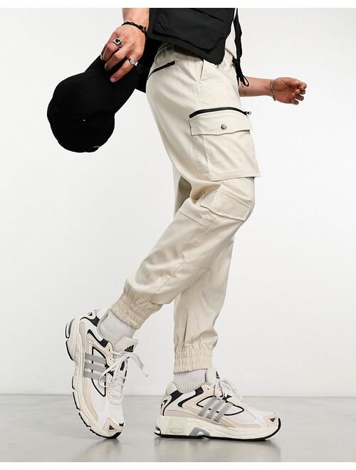 Bershka multipocket cargo sweatpants in sand