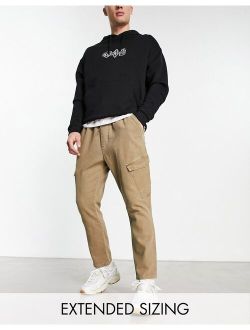 tapered cargo pants in washed brown
